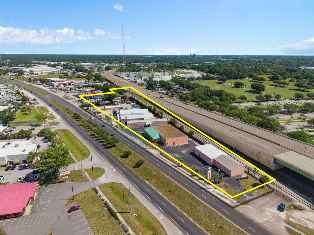 Photo of 4809 N Orange Blossom Trail, Orlando, FL 32810 (MLS # O6418001)