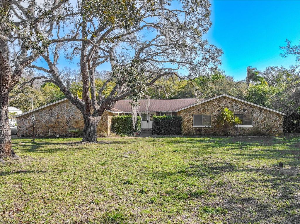 Photo of 10100 Grove Drive, Port Richey, FL 34668 (MLS # TB8361482)