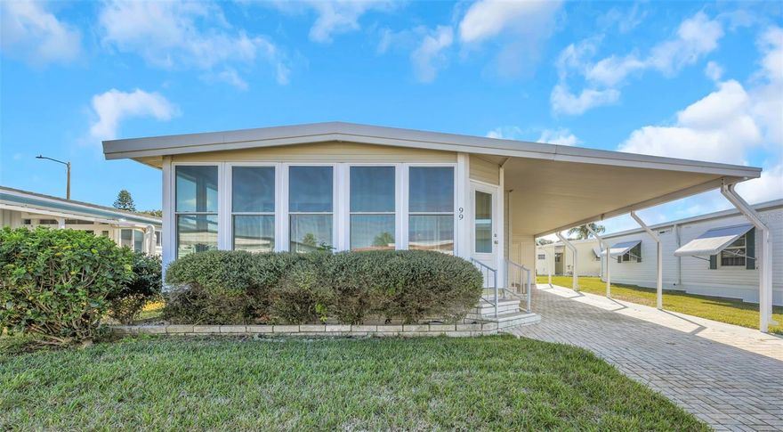 Discover the perfect blend of comfort, style, and carefree living in this beautifully maintained mobile home located in one of Tarpon Springs’ most sought-after active 55+ communities. From the moment you arrive, you’ll appreciate the pride of ownership and the extensive upgrades that make this home truly stand out.

Inside, the home feels fresh, bright, and inviting with new vinyl flooring throughout, offering both durability and a modern aesthetic. New windows fill the space with natural light while improving energy efficiency and enhancing the overall comfort of the home. The updated kitchen is designed for everyday enjoyment, with refreshed finishes, new appliances, ample cabinetry, and a functional layout ideal for cooking, entertaining, or casual dining. Both bedrooms provide ample space and generous size closets. 

The updated water softener and washer and dryer, conveniently located in the outside storage area, help maximize interior living space while offering easy access for laundry needs. The home has also been enhanced with new interior and exterior doors, adding both style and security. Outside, the updated vinyl siding not only boosts curb appeal but also ensures low maintenance living for years to come. One of the standout features is the generous-sized enclosed front porch, providing the perfect space to enjoy your morning coffee, relax with a book, or entertain guests year-round in a comfortable, enclosed setting.

Set within a vibrant and friendly 55+ community, residents enjoy an active lifestyle with a variety of social opportunities, all while being just minutes from Tarpon Springs’ charming downtown, renowned Sponge Docks, waterfront parks, shopping, dining, and Gulf Coast beaches. HOA includes water, trash, sewer, access to all amenities, cable, pest control, on site management, and exterior maintenance.