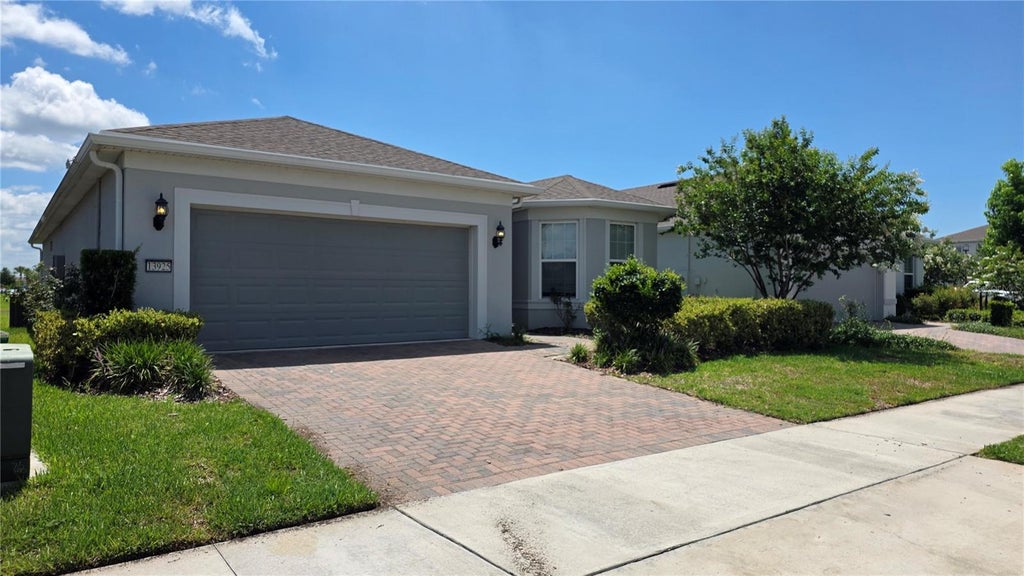 Photo of 13925 Destin Beach Lane, Orlando, FL 32827 (MLS # O6418736)