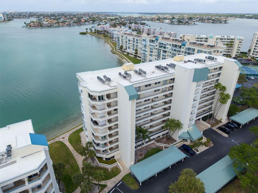 Wake up to shimmering waters and end each day with breathtaking Gulf sunsets in this stunning 4th-floor northwest-facing condo, perfectly positioned along the Intracoastal. From the moment you step inside, you’re greeted by panoramic water views that create a serene, resort-like ambiance throughout the home.  The beautiful open-floor plan with spacious living room, dining room, flowing into the well appointed kitchen is perfect for both everyday living and entertaining. Enjoy a unique pass-through window where you can sip your morning coffee while watching boats drift by.  Split floor plan!  Retreat to the private master suite, tucked away for tranquility, where you’ll find plush carpeting, tranquil water views, and direct access to your covered balcony—the perfect place to unwind and soak in those unforgettable sunsets.
Located in the sought-after Harbourside community, this gated, guard-secured enclave offers true resort-style living. Residents enjoy an unmatched array of amenities, including multiple sparkling pools, a soothing spa, tennis and pickleball courts, fitness centers, and a scenic waterfront walking trail. Boating enthusiasts will love the expansive marina, while outdoor lovers can take advantage of kayak storage, grilling areas, and lush grounds.  The vibrant clubhouse serves as the social heart of the community, offering spaces for every interest—from billiards and card games to a library and woodworking shop. All of this just minutes from the sugar-white sands of St. Pete Beach and the renowned Gulf Coast shoreline.  Whether you're seeking a full-time waterfront sanctuary or a luxurious seasonal escape, this exceptional condo delivers the ultimate Florida lifestyle.  Book your showing today!