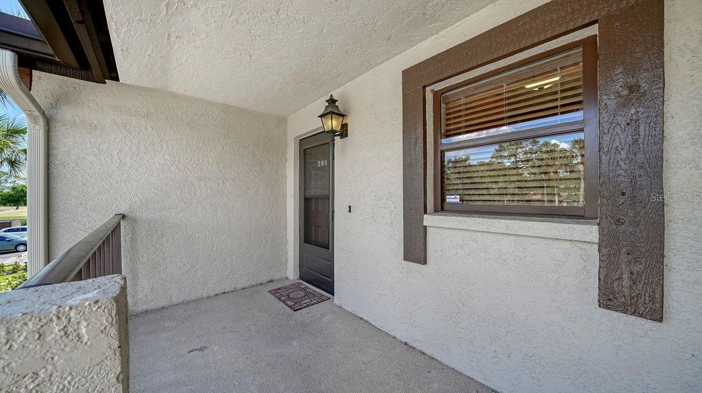 Photo of 5630 Golf Pointe Drive #205, Sarasota, FL 34243 (MLS # A4645005)