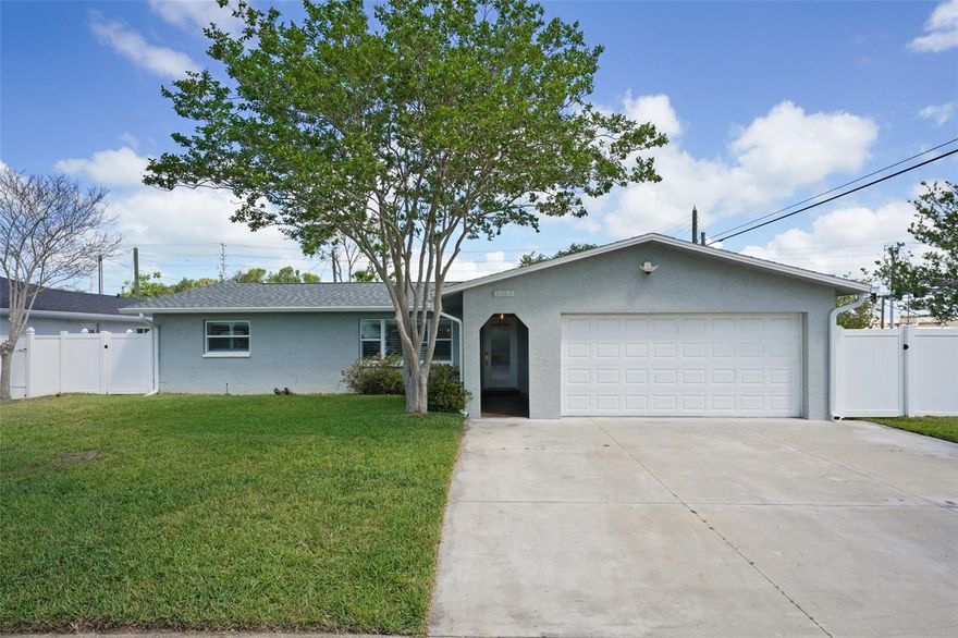 Welcome home to this beautifully renovated residence in the heart of unincorporated Seminole, perfectly positioned on an oversized corner lot spanning ¼ acre. With no HOA and not located in a flood zone, this property offers both freedom and peace of mind while still being just minutes from the Gulf Coast’s stunning beaches. From the moment you arrive, this home is sure to impress with over $100,000 in renovations completed over the last couple of years.

Stepping through the front door, you’re welcomed by a light-filled open concept layout featuring porcelain tile flooring throughout and plantation shutters on every window, creating a cohesive and elevated feel. The fully remodeled kitchen is the true centerpiece of the home, thoughtfully designed with quartz countertops, a large center island with barstool seating, stainless steel appliances, a Bosch dishwasher, Samsung induction range with vent hood, and stylish cabinetry that ties it all together. Seamlessly connected to the main living space, it is ideal for both everyday living and entertaining.

The split bedroom floorplan offers both privacy and functionality, with the spacious owner’s suite featuring a walk-in closet and a beautifully updated ensuite bathroom complete with a modern vanity. Two additional bedrooms are situated on the opposite side of the home, conveniently located near the fully renovated guest bathroom. Toward the rear of the home, a sunlit Florida room provides additional flexible living space and leads out to the screened-in lanai overlooking the expansive backyard. With new vinyl fencing and a double-wide gate, this outdoor space is a true blank canvas with plenty of room to create your dream oasis, add a pool, or store recreational toys.

Major updates provide added peace of mind, including impact windows installed in 2017, a new roof in 2021, a 3.5-ton York AC system with Halo Remy UV air purifier in 2021, a new electrical panel with upgraded 200-amp service and EV charger, new water heater, blown-in insulation, aluminum gutters, and updated exterior doors. An LG washer and dryer are also included for added convenience.

This location puts you in the center of it all, with close proximity to our beautiful Gulf Coast beaches. Madeira Beach, Redington Shores, and Indian Shores are all just a short drive away, making sunset walks, weekend beach days, and waterfront dining part of your everyday routine. For outdoor lovers, Boca Ciega Millennium Park is also nearby, offering scenic boardwalks, an observation tower, nature trails, and convenient access to the Pinellas Trail for biking, walking, and jogging. Sought-after “A” rated Bauder Elementary and other top Seminole schools are just down the road.

Daily convenience is another major plus, with Seminole City Center, grocery stores, coffee shops, shopping, dining, and local favorites all just minutes from home. With easy access to Park Boulevard and surrounding main roads, travel to Clearwater, St. Petersburg, Tampa, and both international airports is simple and convenient.

This one truly checks all the boxes, schedule your private showing today!