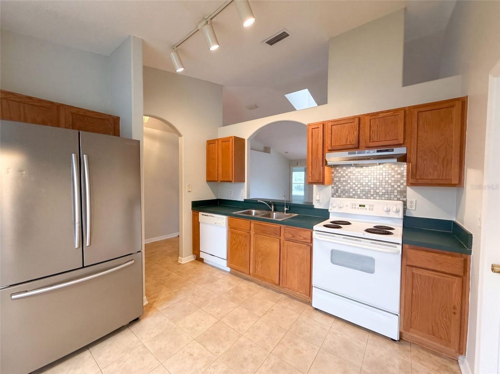 Photo of 18 Rolland Lane, Palm Coast, FL 32164 (MLS # O6449134)
