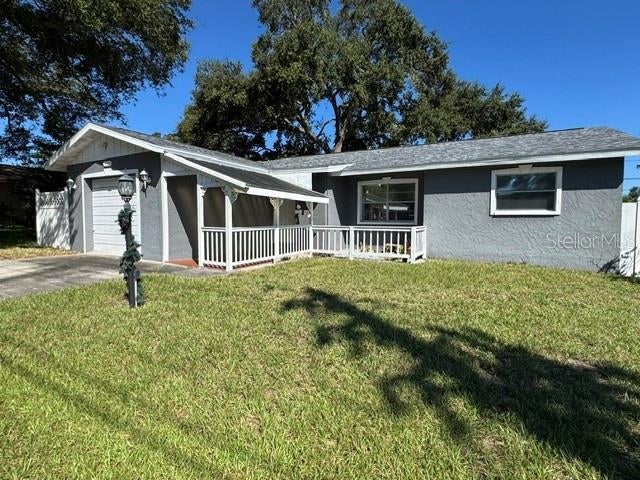 Photo of 11365 Walsingham Road, Seminole, FL 33778 (MLS # TB8554382)