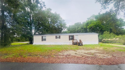Photo of 4053 NE 213th Terrace, Williston, FL 32696 (MLS # GC540767)