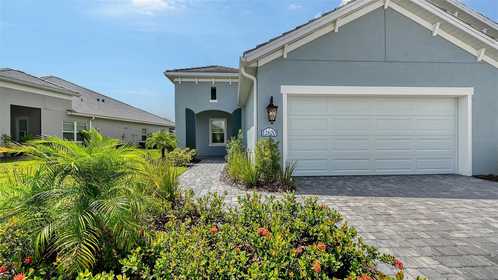 Step into this beautifully designed Sandcastle 2 home, where spacious living meets modern comfort. Featuring wood-look tile flooring throughout, 8' interior doors, and soaring 9'4" ceilings, this home feels open, bright, and welcoming.
The upgraded kitchen is a true centerpiece, complete with white cabinetry, quartz countertops, and a large island—ideal for entertaining guests or enjoying family gatherings.
A pocket sliding glass door fully opens the great room to a covered, screened lanai, blending indoor and outdoor living. Retreat to the private master suite, which boasts a large walk-in closet and split vanities for added convenience.
Enjoy peace of mind with impact windows and smart home features, plus low-maintenance living with lawn care and community amenities included in the low HOA fee.
Located in Grand Palm, a resort-style, amenity-rich, natural gas community, just minutes from Downtown Venice, Wellen Park, gorgeous Gulf Coast beaches, and I-75—this home offers both luxury and location.