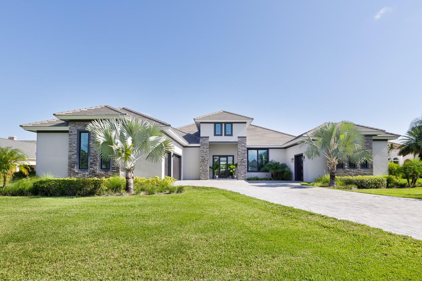 Welcome to Steeplechase, one of Odessa's most exclusive gated communities. This smart home was built in 2020 with top end finishes and designed with an open floor concept. This estate sits on 2.6 acres of lush greenery and the back yard is a blank canvas for any outdoor space you can dream of. Inside the home, the master suite sits on the opposite side of home from the other 3 bedrooms. At entry, off the foyer, sits a great office/den with custom cabinetry and desk. The master bedroom is very spacious and includes 2 custom built, walk-in closets, an en-suite bathroom, and French doors to the back of house. The slim profile fireplace provides ambient mood in the living area and the space provides a great view to the large backyard. With all Miele, stainless steel appliances and wine fridge, the double islands provide a great space for entertaining and are just off the dining space which would be perfect for hosting any family gathering. The laundry room is equipped with Samsung washer and dryer and plenty of storage space. This house contains 2 garages both with epoxy floor finishings. The 3-car garage has access to house and another 1-car garage sits directly across paved driveway. Bathroom off bedroom 4 is shared with the playroom/gym and also has door to access the back patio which is equipped with outdoor gas grill and bar area. With 11 ft ceilings throughout, this home is move-in ready and a must-see! *Since listing, all furnishings have been removed and all accent walls have been painted- no longer different color walls in bedrooms and new, solid finish garage doors have been installed and images have been updated and noted. Price adjustment is to allow buyer to create desired backyard oasis/pool design.