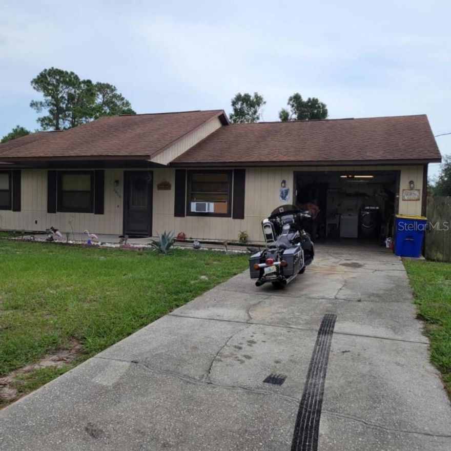 ** Back on the Market ** This 3/2 house was built in 1992 and sits on a 10,00 Sq. Ft corner lot. The bedrooms have good sized closets, open kitchen and dining room with plenty of cabinet spaces and two full bathrooms. The house also features a rear screen in patio, attached garage and a large fenced in rear yard. The roof is approx. 8 years old. Brand new A/C unit. This would make a great family home, close to major highways, beaches, shopping, restaurants, and entertainment. This will not last long. ;Water: City