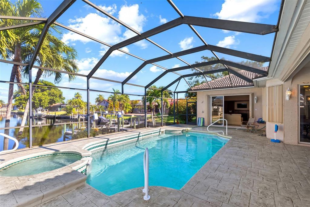 Photo of 1935 SE 26th Street, Cape Coral, FL 33904 (MLS # TB8475012)