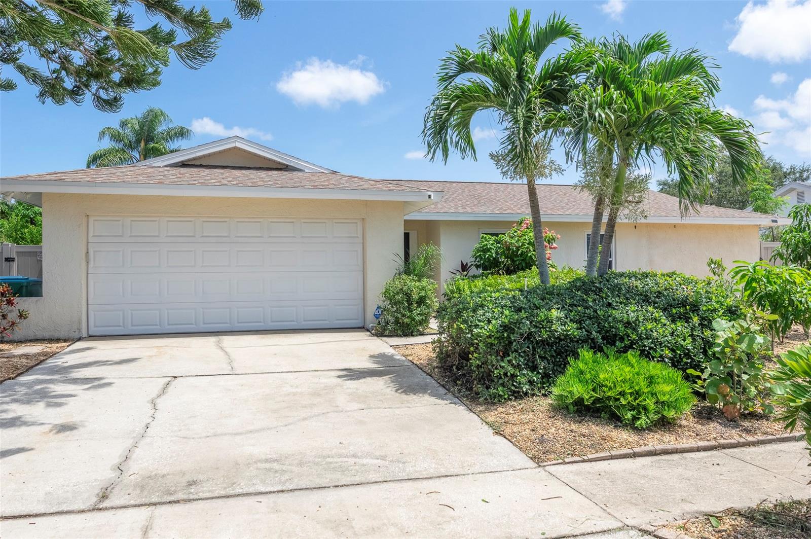 This property is a charming and well-maintained single-family home built in 1977. It features three spacious bedrooms and two full bathrooms, making it ideal for families or those who enjoy having extra space for guests or a home office. This traditional layout, with a separate living area that includes a combination dining area adjacent to the kitchen and a cozy family room with fireplace.
The exterior of the home boasts a spacious two-car garage, providing ample storage and parking space. One of the standout features of this property is its lush outdoor space, which is adorned with a variety of fruit trees. These trees not only enhance the beauty of the property but also offers the opportunity for homegrown fruit and a touch of nature right in your backyard. Adding to the property's appeal are environmentally friendly solar panels, which help reduce energy costs and contribute to sustainable living. The backyard is a private oasis, complete with a swimming pool that offers a refreshing escape during warmer months. Whether you're hosting poolside gatherings or enjoying a quiet afternoon dip, this feature enhances the outdoor living experience. For added peace of mind, the home is equipped with a whole-house generator, ensuring that you have a reliable power source during outages. This feature is particularly valuable for maintaining comfort and convenience in any situation. Overall, this 1977-built home combines classic charm with modern amenities, making it a comfortable and inviting place to live. Its array of features caters to a lifestyle that values both indoor comfort and outdoor enjoyment. MUST SEE TODAY!!!