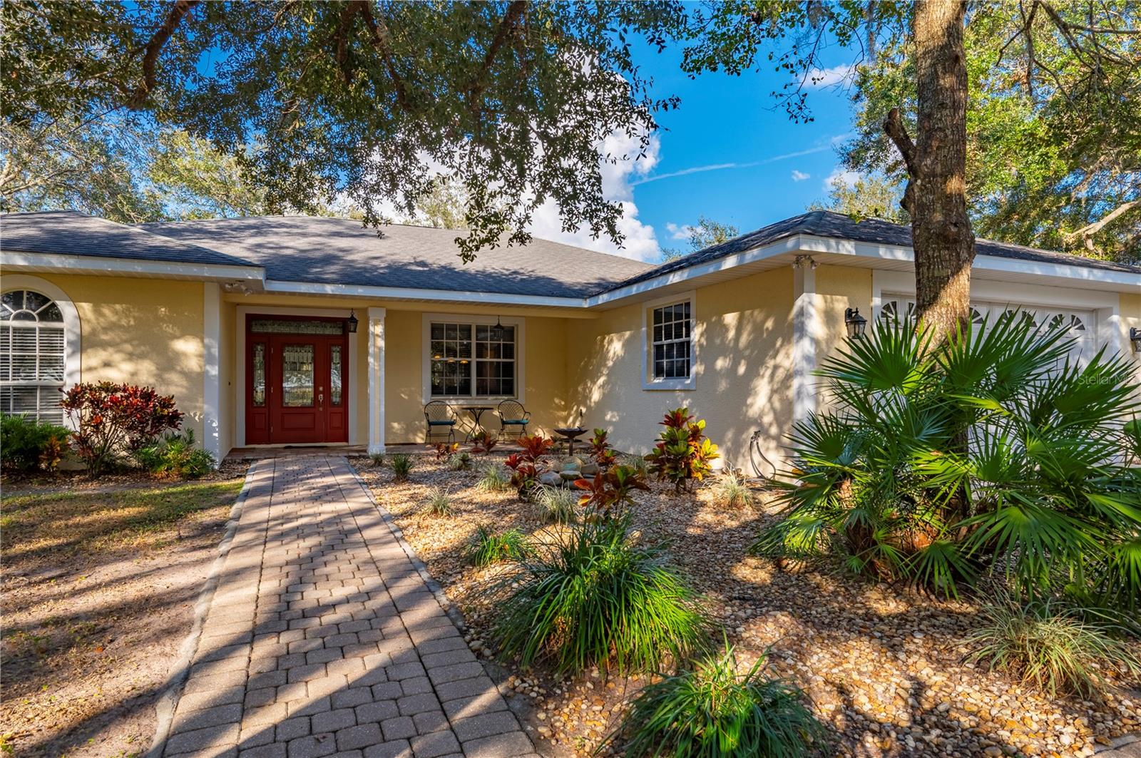 Well located property with beautiful oaks and outdoor shop/barn that is not far from town. This well maintained 3/3 home is ideal for those seeking a Hobby Farm or quiet country life.