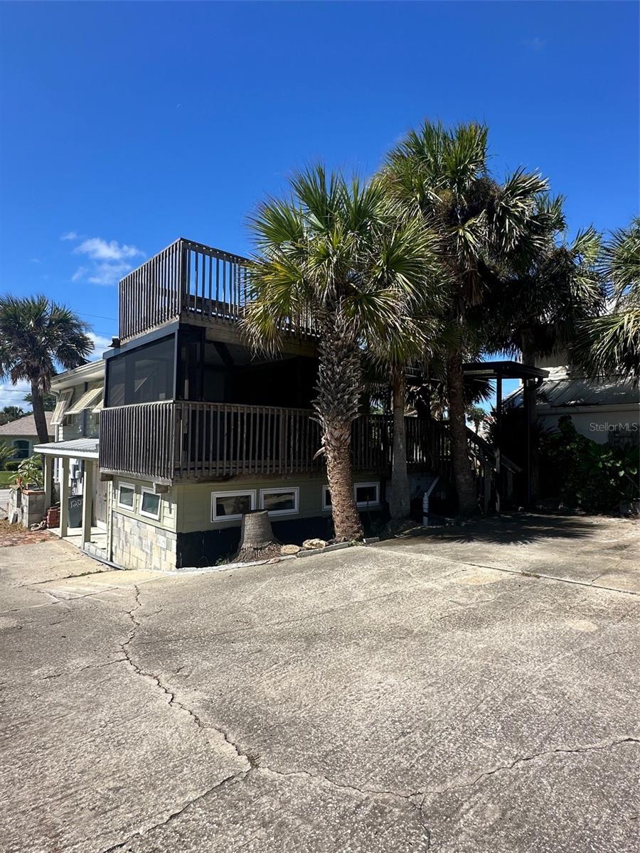 Enjoy beachside living in this charming 2 bedroom, 2 bath garage apartment featuring a covered balcony with stunning beach views. This unit offers convenient beach access, making it easy to enjoy the sun and surf anytime. Includes a washer and dryer for added convenience. Don’t miss this opportunity to live just steps from the sand in a cozy and private beach retreat!