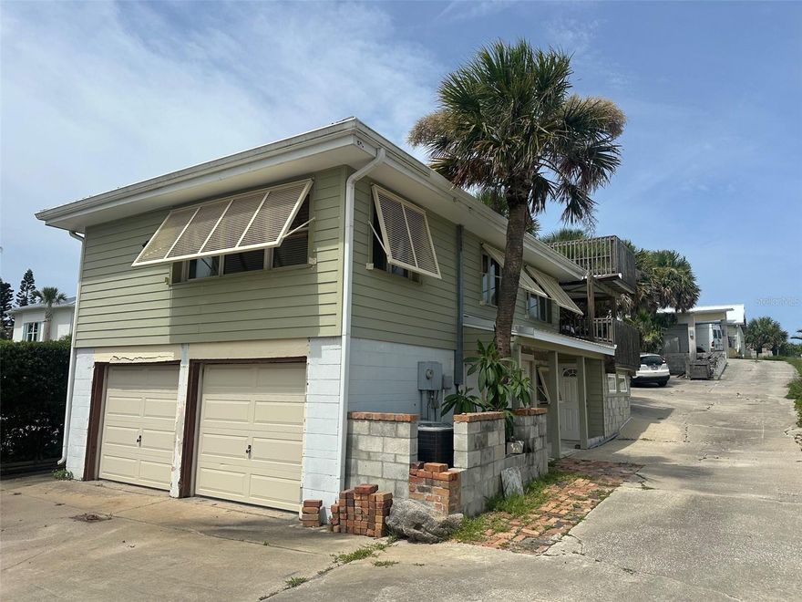 Enjoy beachside living in this charming 2 bedroom, 2 bath garage apartment featuring a covered balcony with stunning beach views. This unit offers convenient beach access, making it easy to enjoy the sun and surf anytime. Includes a washer and dryer for added convenience. Don’t miss this opportunity to live just steps from the sand in a cozy and private beach retreat!