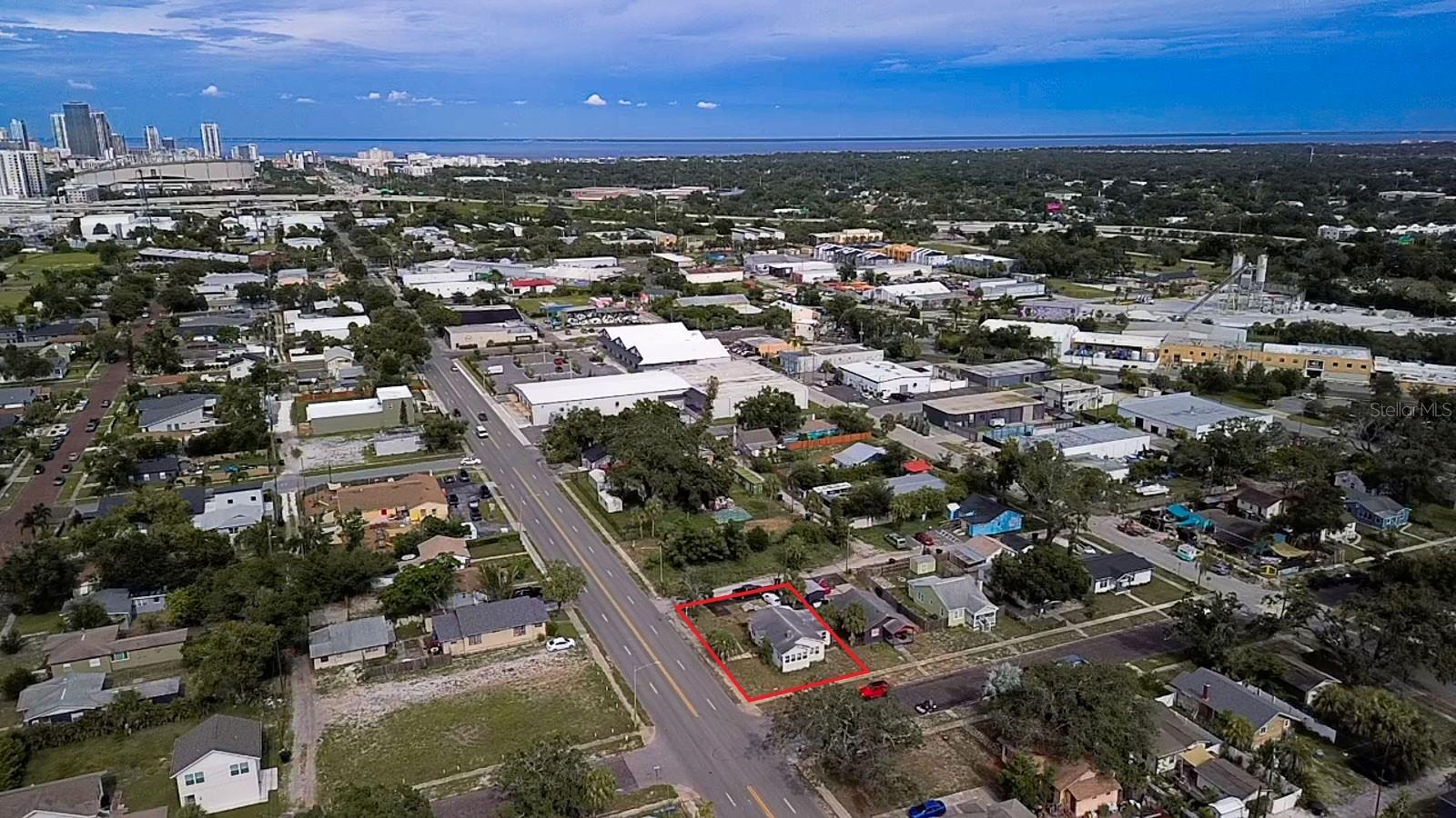 Prime corner lot in the heart of St. Petersburg’s booming Warehouse Arts District! Located at 2560 5th Ave S., this income-producing property currently serves as a single-family rental featuring 3 bedrooms, 1 bathroom, and 1,170 sq ft of living space. Recent updates include a newer roof, HVAC, and electrical system—offering turnkey use while you plan for future development.
The real opportunity lies in the land and location. Zoned Industrial Traditional (IT), this flexible zoning allows for a wide range of uses, including commercial, warehouse, retail, flex-space, artist studios, or live/work environments—all with minimal setbacks and maximum creativity. With 100 feet of frontage on busy 5th Ave S, 60 feet on 26th St S, and 60 feet on the side alley, this corner lot boasts outstanding visibility, signage potential, and multiple access points for customers, deliveries, or future tenants.
What truly sets this property apart is its central location within the vibrant Warehouse Arts District, one of the most exciting and fastest-growing areas in the city. Surrounded by thriving local businesses, artist studios, and innovative commercial spaces, this property is within a short distance to popular destinations like The Urban Stillhouse, Bayboro Brewing, Golfology, CrossFit gyms, FloridaRAMA, the Pinellas Bike Trail, and more. There’s even a bus stop just steps away, adding public transit convenience to an already highly trafficked corridor.
5th Ave S is a major east-west artery, feeding constant flow through the Arts District and connecting directly to Downtown St. Pete—just minutes away. You're also just five blocks south of Central Ave, putting you a short walk to the bustling Grand Central District, known for its eclectic mix of restaurants, bars, boutiques, and community events.
Whether you're looking to create a unique live/work compound, a destination retail space, or invest in one of St. Pete’s most artistically and commercially active neighborhoods, 2560 5th Ave S presents a rare chance to capitalize on built-in foot and vehicle traffic, high visibility, and unmatched zoning versatility.
This is your chance to reimagine, rebuild, and revitalize—in one of St. Petersburg’s most dynamic and high-demand corridors. Opportunities like this are limited—don’t miss your moment.