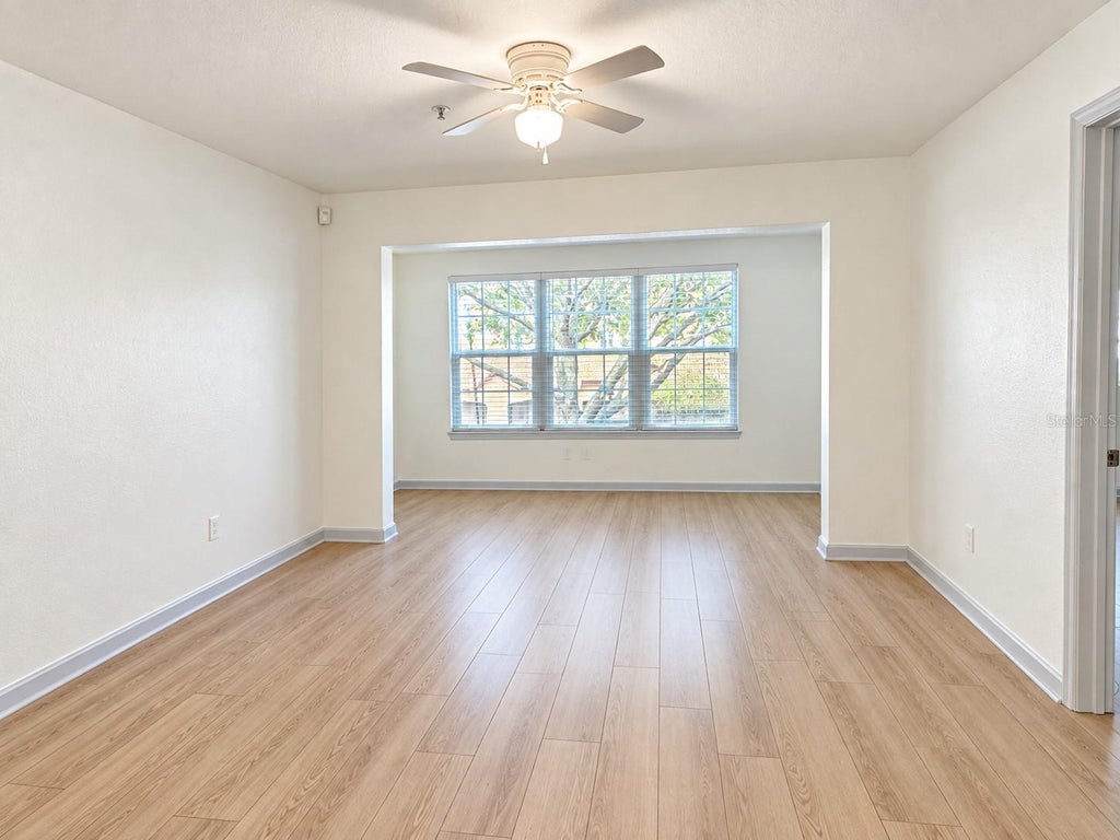 Photo of 5471 Vineland Road #7204, Orlando, FL 32811 (MLS # O6447305)