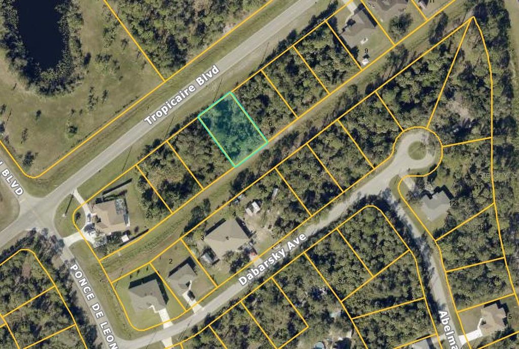 Photo of Tropicaire Boulevard, North Port, FL 34291 (MLS # O6388298)