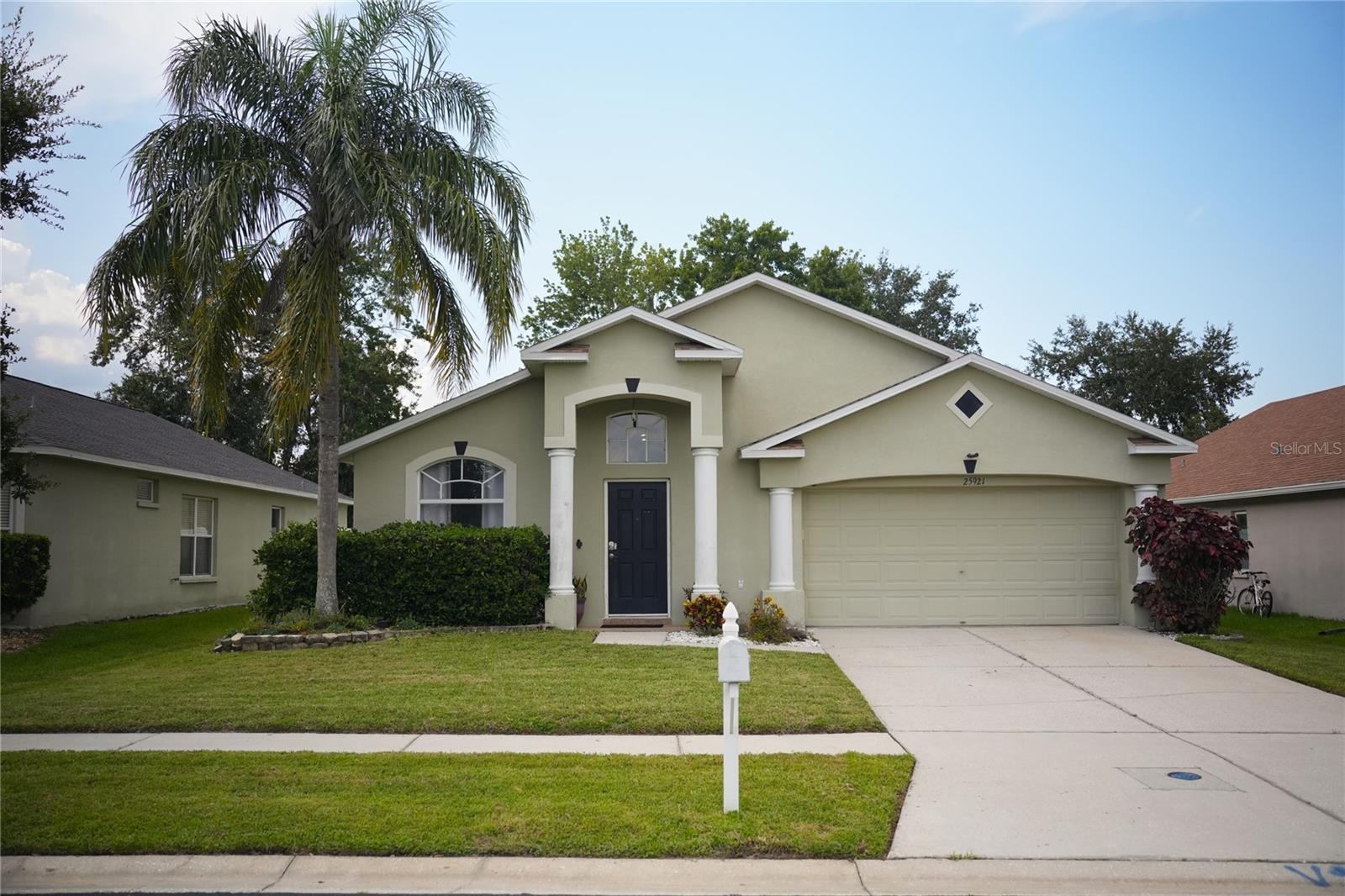 NO CDD FEES, LOW HOA, Flood Zone X, and conveniently located near shopping, dining, and quick access to interstate I-75 and I-275. Solid 3-bedroom, 2-bath single family home, with vaulted ceilings that create a bright, open living space filled with natural light. The split floorplan offers privacy and functionality, with a spacious primary suite featuring a walk-in closet and comfortable secondary bedrooms. The kitchen features granite counter tops and stainless steel appliances. Enjoy the outdoors with a screened patio and nice-sized fully fenced backyard - ideal for pets, play, or weekend barbecues! Situated in a friendly neighborhood with access to a community pool and playground this home is perfect for families or anyone looking for a peaceful retreat or potential investment opportunity. NEWER ROOF 2022, and HVAC SYSTEM REPLACED 2023! Don't miss this opportunity to own this well located gem with everything you need to feel right at home! Just minutes away from the Grove at Wesley Chapel, Tampa Premium Outlets, and Wiregrass Mall...