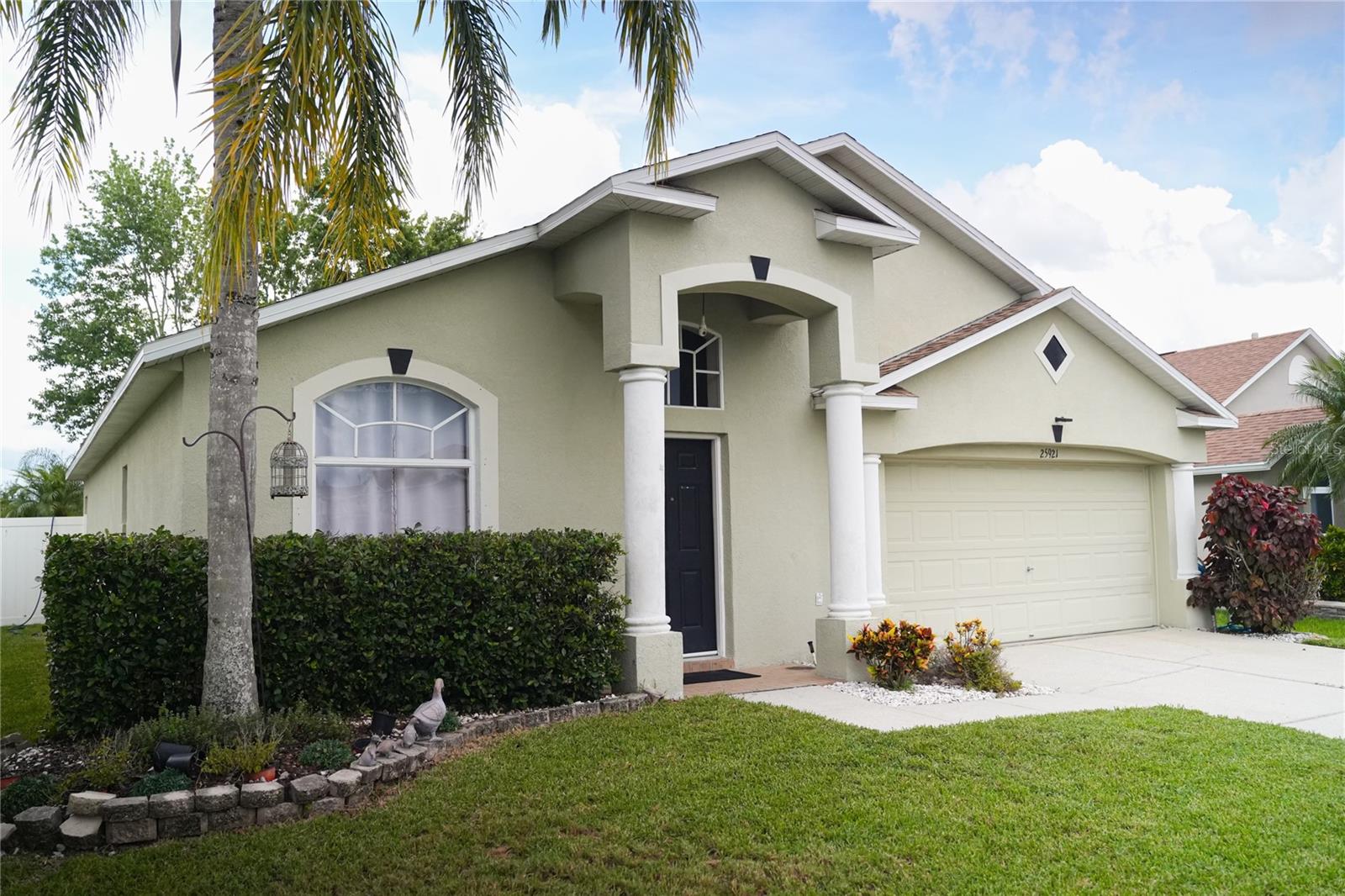 NO CDD FEES, LOW HOA, Flood Zone X, and conveniently located near shopping, dining, and quick access to interstate I-75 and I-275. Solid 3-bedroom, 2-bath single family home, with vaulted ceilings that create a bright, open living space filled with natural light. The split floorplan offers privacy and functionality, with a spacious primary suite featuring a walk-in closet and comfortable secondary bedrooms. The kitchen features granite counter tops and stainless steel appliances. Enjoy the outdoors with a screened patio and nice-sized fully fenced backyard - ideal for pets, play, or weekend barbecues! Situated in a friendly neighborhood with access to a community pool and playground this home is perfect for families or anyone looking for a peaceful retreat or potential investment opportunity. NEWER ROOF 2022, and HVAC SYSTEM REPLACED 2023! Don't miss this opportunity to own this well located gem with everything you need to feel right at home! Just minutes away from the Grove at Wesley Chapel, Tampa Premium Outlets, and Wiregrass Mall...