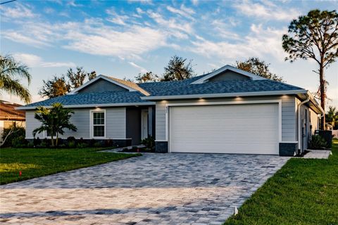 Photo of 627 SE 22nd Terrace, Cape Coral, FL 33990 (MLS # C7511593)