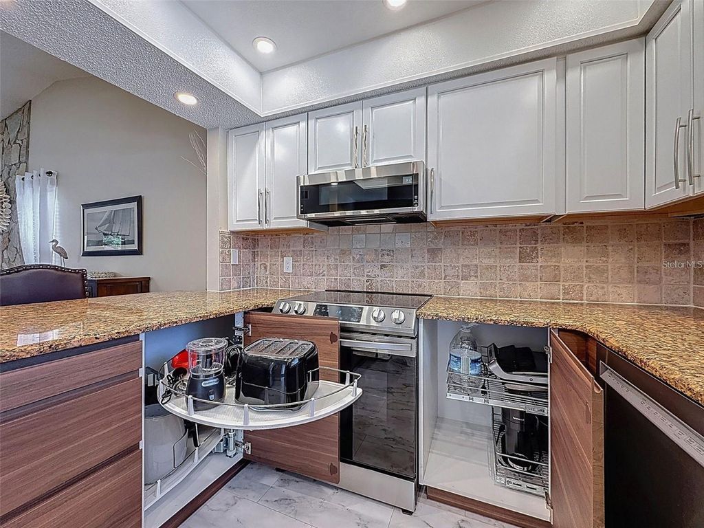 Photo of 9981 Eagles Pt Circle #4, Port Richey, FL 34668 (MLS # TB8503808)