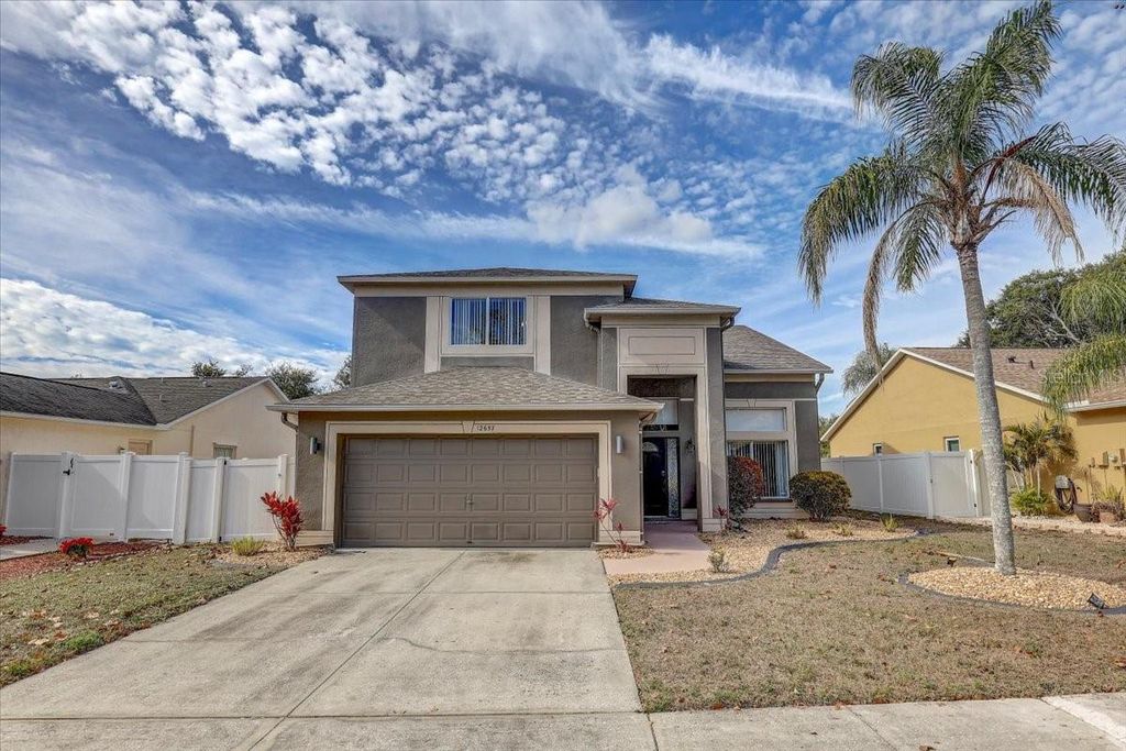 Photo of 12657 Longcrest Drive, Riverview, FL 33579 (MLS # TB8460619)