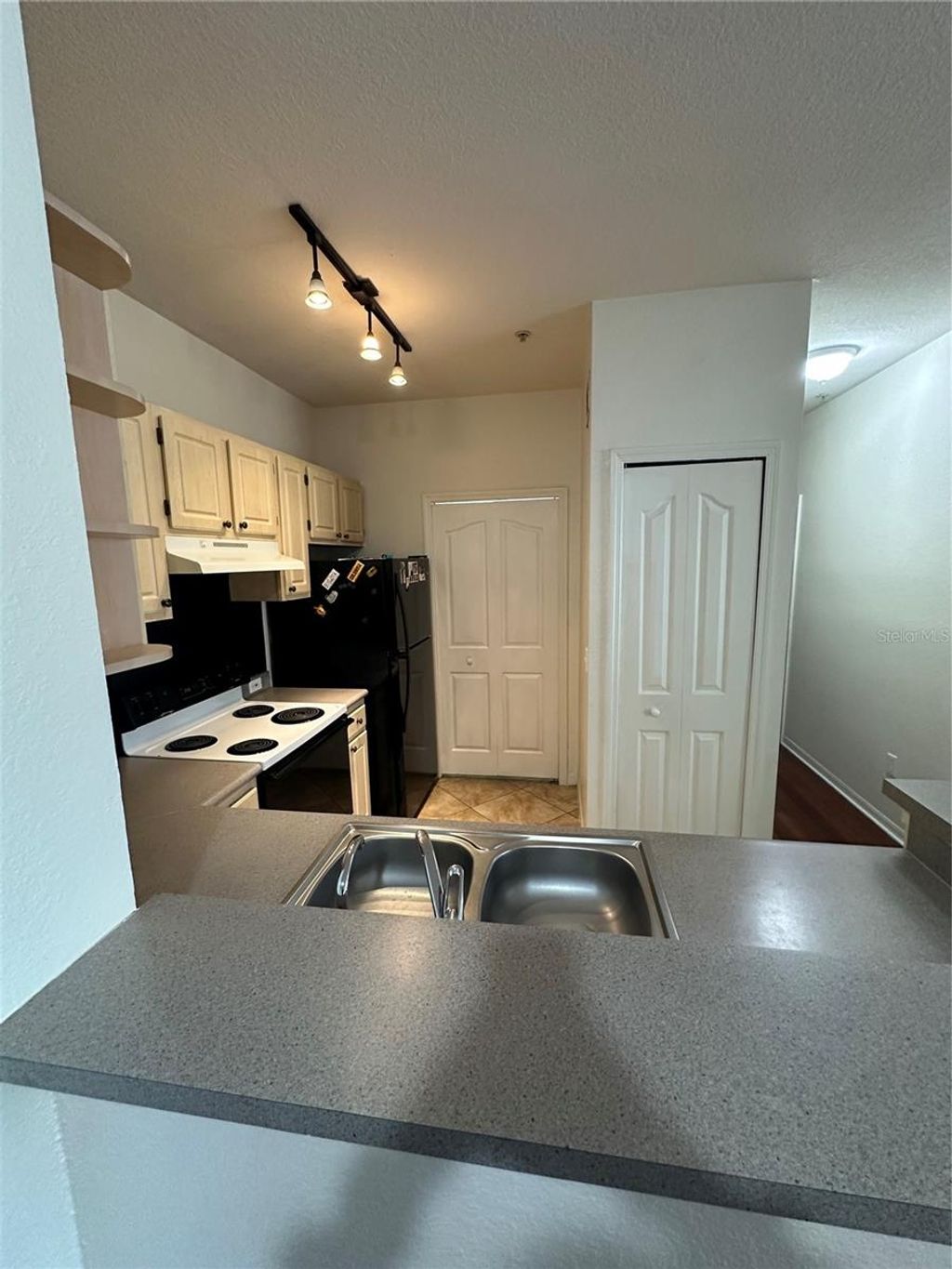 Photo of 2717 Maitland Crossing Way #103, Orlando, FL 32810 (MLS # O6384243)