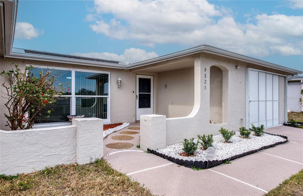 Photo of 9825 Aetna Lane, Port Richey, FL 34668 (MLS # TB8477290)