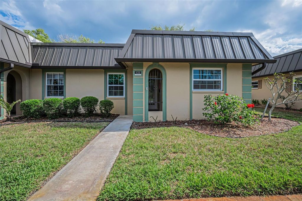 Photo of 4200 Hampton Drive #4200, New Port Richey, FL 34652 (MLS # TB8502819)