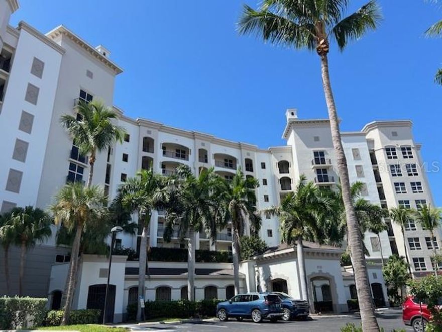 SEASONAL 2026 - Burnt Store Marina Rental - Grand Isles Tower II - Olympic Size Pool just steps away from this 1st Floor Condo - Relax on screened Lanai or Walk-Out to spacious, extended Patio and Chairs and Watch Boaters coming and going from the Marina to Charlotte Harbor...Intercoastal Waterway....Gulf of Mexico just 10 nautical miles away...Rent a Boat or Bring your Boat and enjoy trips for Lunch, Shelling, and Beaches on nearby Barrier Islands where the Dolphins frolic in the water!...This is a spotless...luxury condo...fully furnished/turnkey...Two large bedrooms and huge daybed with desk doubles as 3rd bedroom for guests....Stainless Appliances...Upscale furnishings thru-out...Kitchen with breakfast bar...formal dining...and Charlotte Harbor Views everywhere...The Grand Isles have 50 ft. long Pools and Hot Tub....Waterviews of Harbor...Built-In Grills for outside dining...Social Room for Meeting new Friends..Billard Table...Entertainment Center...Catering Kitchen and Bar ....15 Seat Theatre Room...Fitness Center, Steam Room and Spa...Under Building Parking space...BSM has 27 Hole Public Course...Clubhouse and Restaurant with lots of Activities and Music...TWO WATERFRONT restaurants with Marina Views...Golf Cart Rentals and Beautiful Sunsets over the Harbor almost every nite...Renting doesn't get any better than this!!!