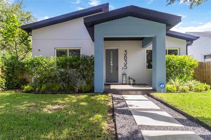 **Under Contract ~ Accepting Backup Offers**   **MASSIVE PRICE DROP ~ SELLER SAYS SELL!!**   Contemporary 4BR / 3 BA / DETACHED ADU in Prime St. Pete Location!  Built with stylish and efficient BLOCK CONSTRUCTION, this home boasts soaring 10-ft CEILINGS, HURRICANE IMPACT PGT WINDOWS, and wide-plank WOOD LAMINATE FLOORING. The CHEF'S KITCHEN impresses with SAMSUNG APPLIANCES, SHARP MICROWAVE DRAWER, GAS range, GRANITE counters, and CUSTOM CABINETRY with UNDER-CABINET LIGHTING.  The open-concept living and dining area flows seamlessly to a screened patio with recessed lighting, ceiling fan, TV hookup, and built-in speakers—perfect for indoor/outdoor entertaining. The primary suite is a true retreat featuring a SPA-INSPIRED BATH, OVERSIZED WALK-IN SHOWER, DESIGNER FINISHES, and CUSTOM CLOSETS.  SMART HOME pre-wiring, a TANKLESS GAS WATER HEATER, and a WHOLE-HOME SPEKER system add comfort and convenience. Outdoors, enjoy a fully FENCED YARD with native landscaping and PRIVATE WELL IRRIGATION.  A detached 2-car garage is topped by a 530 sqft ADU complete with a full bath and private entrance—ideal for guests, in-laws, a home office, or RENTAL INCOME opportunity.  Just minutes from downtown St. Pete, Gulf beaches, and SunRunner transit, this home offers high-end living in a walkable, vibrant neighborhood. CALL THE LISTING AGENT TODAY FOR A PRIVATE SHOWING!