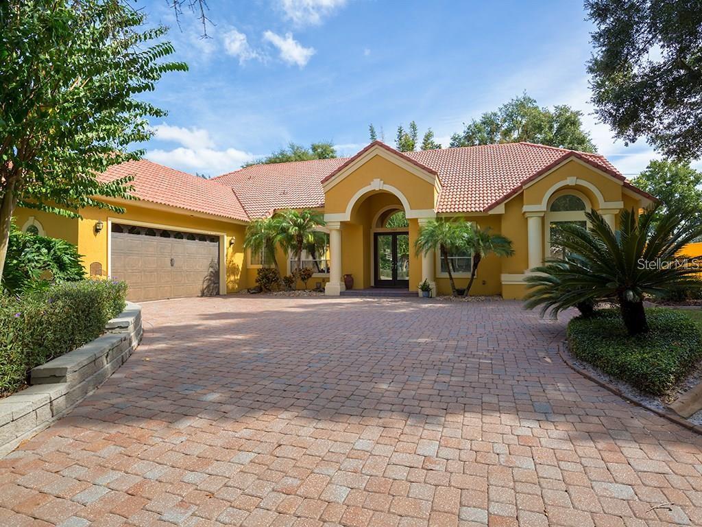 Photo of 7407 Park Springs Circle, Orlando, FL 32835 (MLS # O6444704)