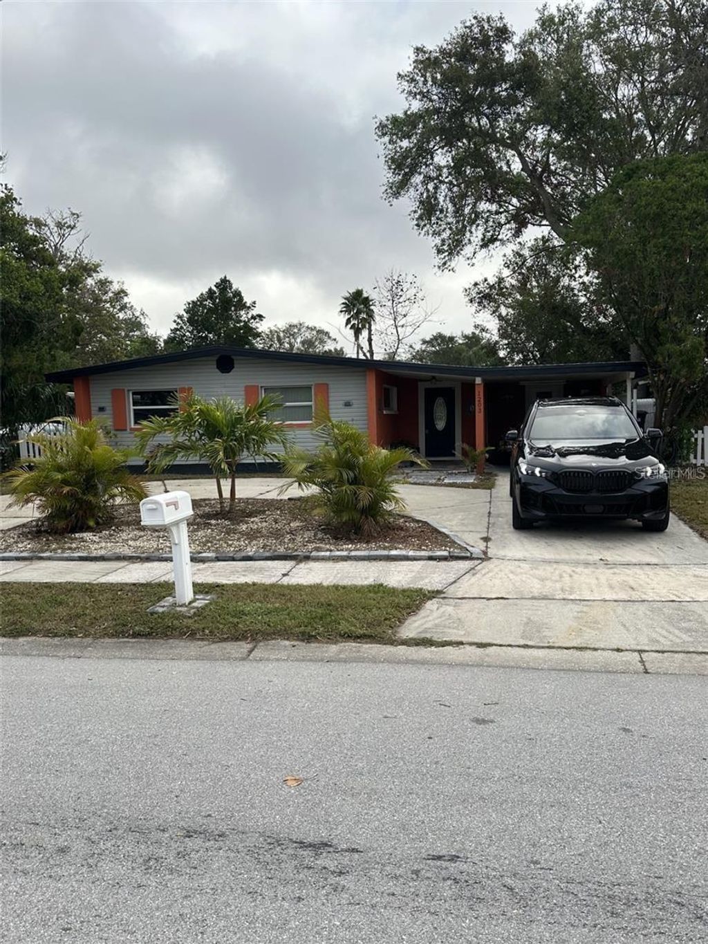 Photo of 1203 N Saturn Avenue, Clearwater, FL 33755 (MLS # O6379922)