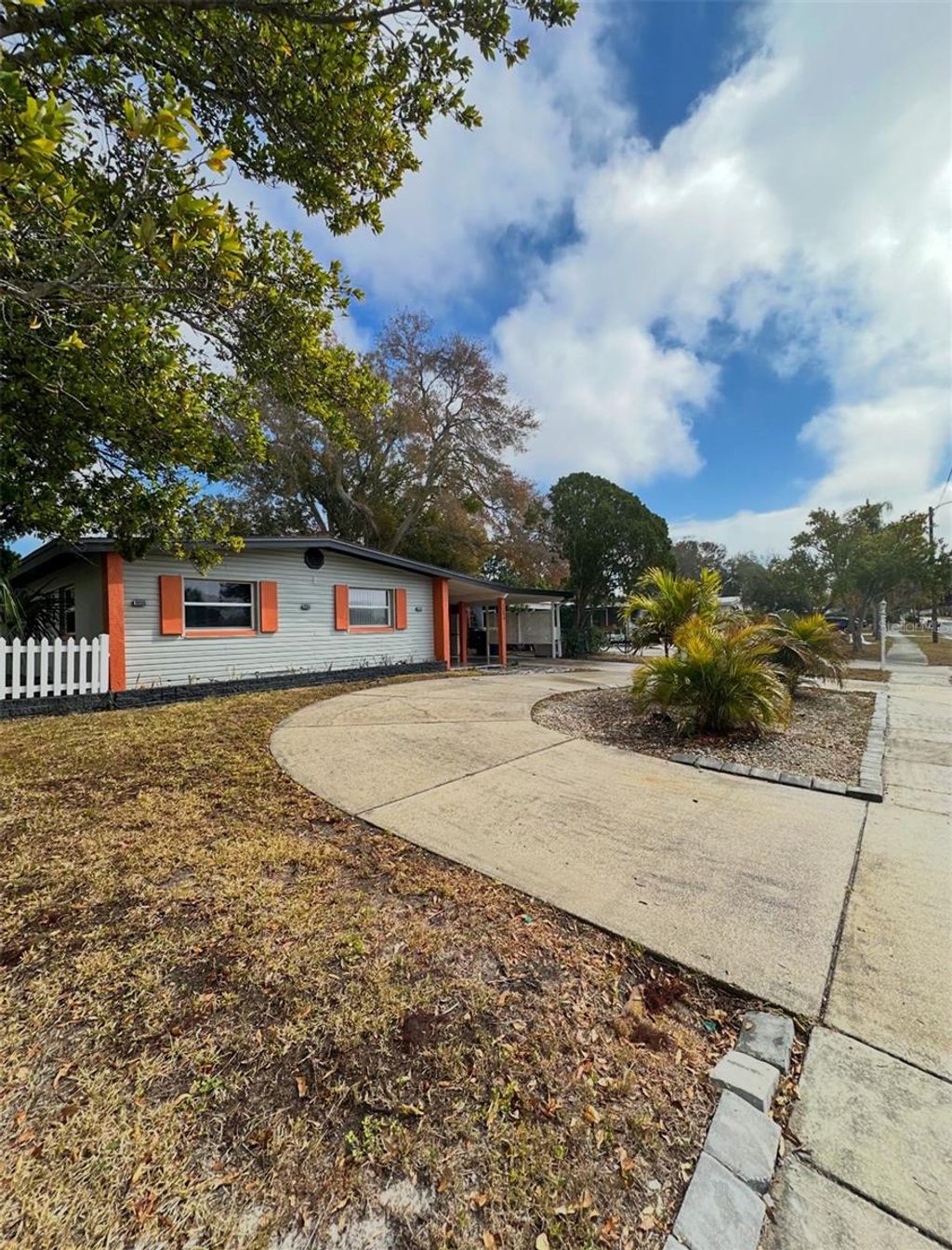 Photo of 1203 N Saturn Avenue, Clearwater, FL 33755 (MLS # O6379922)