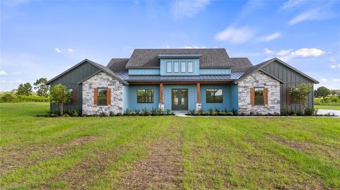 Photo of 20130 Sugarloaf Mountain Road, Clermont, FL 34715 (MLS # O6339575)