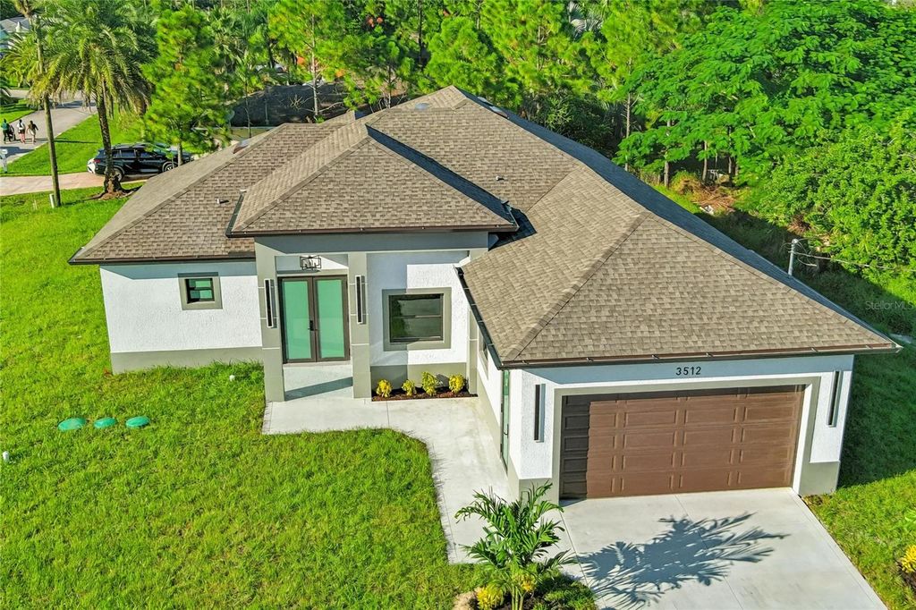 Photo of 3512 9th Street W, Lehigh Acres, FL 33971 (MLS # O6407000)