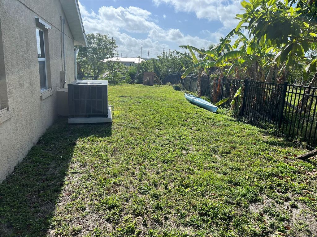 Photo of 705 Crestview Circle NW, Port Charlotte, FL 33948 (MLS # C7514553)