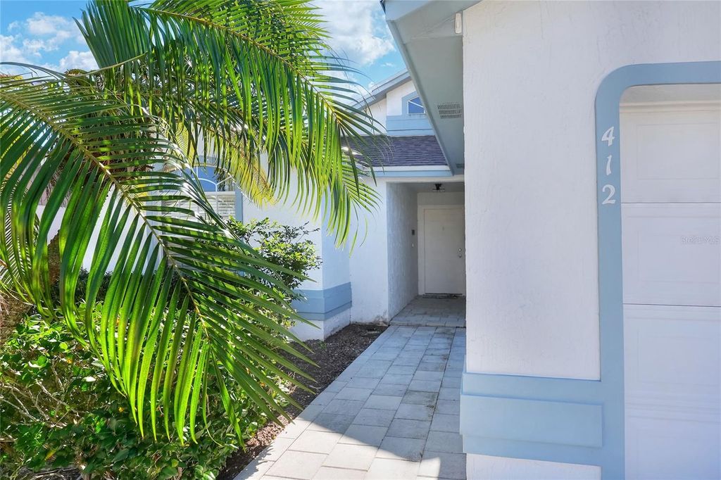 Photo of 412 Emerald Cove Loop, Lakeland, FL 33813 (MLS # L4958355)