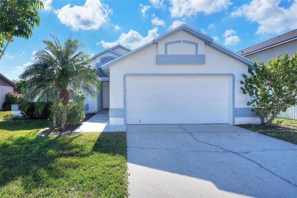 Photo of 412 Emerald Cove Loop, Lakeland, FL 33813 (MLS # L4958355)