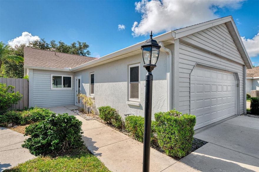 Fantastic opportunity with this beautifully maintained 2-bedroom, 2-bathroom detached villa in Ironwood Villas. NEW ROOF 2025! Just 2.5 miles from Historic Downtown Venice and the stunning Gulf Coast beaches. Unlike typical villas, this home offers the feel of a traditional single-family residence with its fully detached layout and spacious design. Great updated front entryway gives you additional space and a unique front porch area. Large living space with cathedral ceilings and lots of natural light. The kitchen features a cozy eat-in breakfast nook, ideal for casual mornings or entertaining guests. Large primary bedroom with a walk-in closet and en-suite bathroom. Convenient two car garage with lots of storage and laundry. All new fresh paint inside. Recent updates include Impact Windows 2018, Impact glass front door 2018, and garage door 2018. Enjoy outdoor living with a gated side patio, perfect for pets or relaxation. Ironwood Villas is a low-fee, well-kept community offering a clubhouse, community pool, and included lawn maintenance. Best of all, NO CDD fees! Located off Capri Isles Blvd, you’ll be minutes from Venice’s vibrant downtown, with its charming shops, dining, and year-round events. Don’t miss your chance to own this exceptional home! Schedule your showing today!