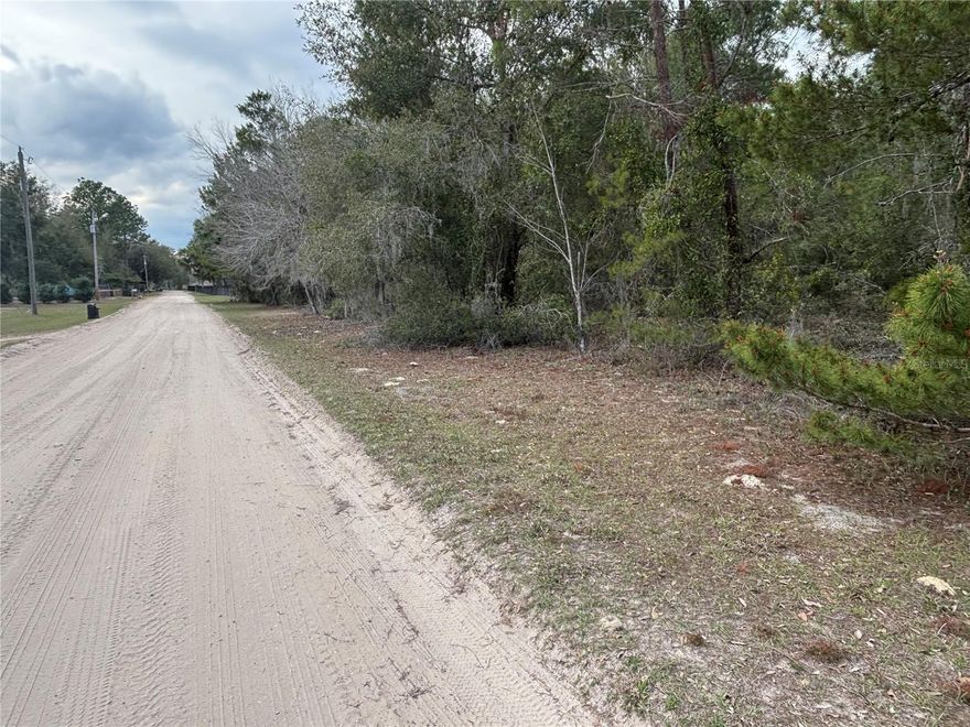 1.44 acres just minutes from the beach. Nicely wooded and totally buildable with plenty of border room for privacy.