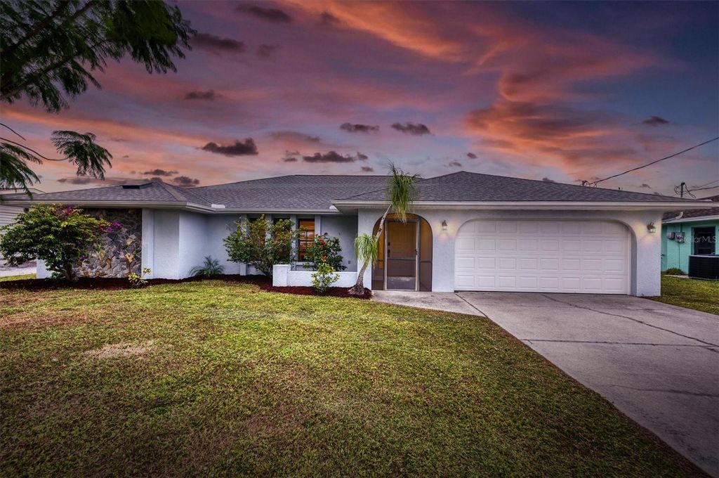 Photo of 12314 Kneeland Terrace, Port Charlotte, FL 33981 (MLS # C7517347)