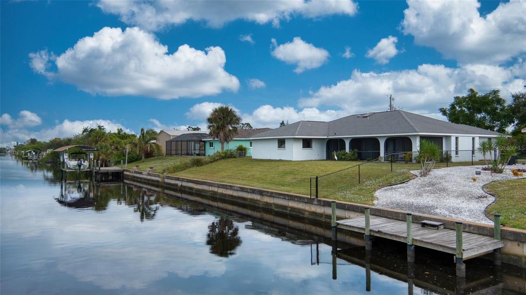 Photo of 12314 Kneeland Terrace, Port Charlotte, FL 33981 (MLS # C7517347)