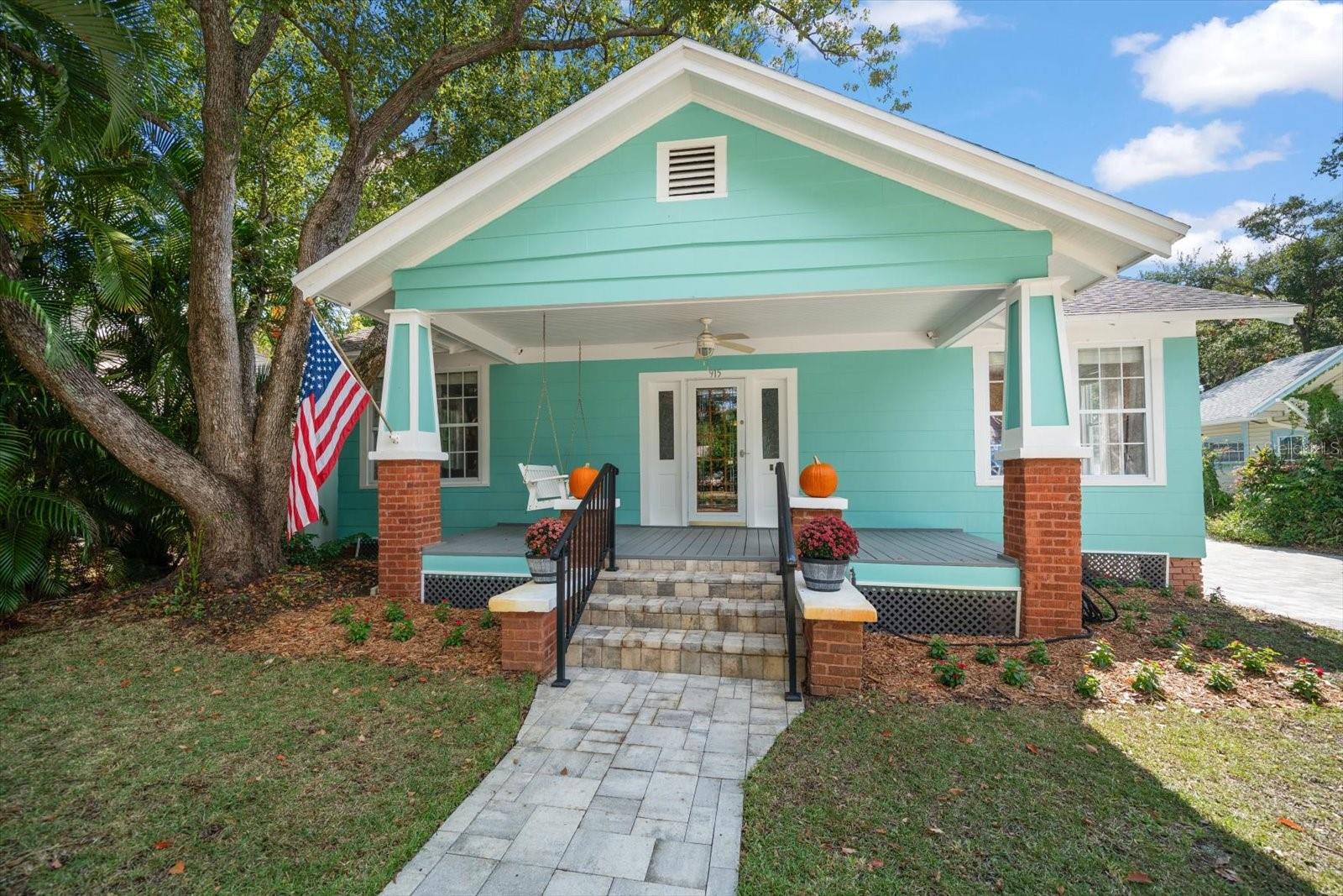 Step into the timeless elegance of this beautifully maintained 1925 Craftsman-style home, offering 2 bedrooms, 1.5 bathrooms, and the perfect blend of old Florida charm with modern updates. From the moment you arrive, you'll be captivated by the welcoming front porch and classic architectural details that make this home truly special. Enjoy a resort style backyard with a heated salt water pool and spa (2018), surrounded by a gorgeous paver deck, an outdoor shower, and a covered bar area ideal for grilling, dining, and unwinding with friends and family. The detached 2-car garage features an additional finished room perfect for a home office, gym, studio, or den. There's ample space to store a boat or RV, plus a separate carport for your extra toys. The entire backyard is enclosed with a 6-foot PVC privacy fence, creating your own private retreat. Located just minutes from downtown Clearwater, this is a rare opportunity to own a unique home with character, functionality, and incredible outdoor living. Don’t miss it!