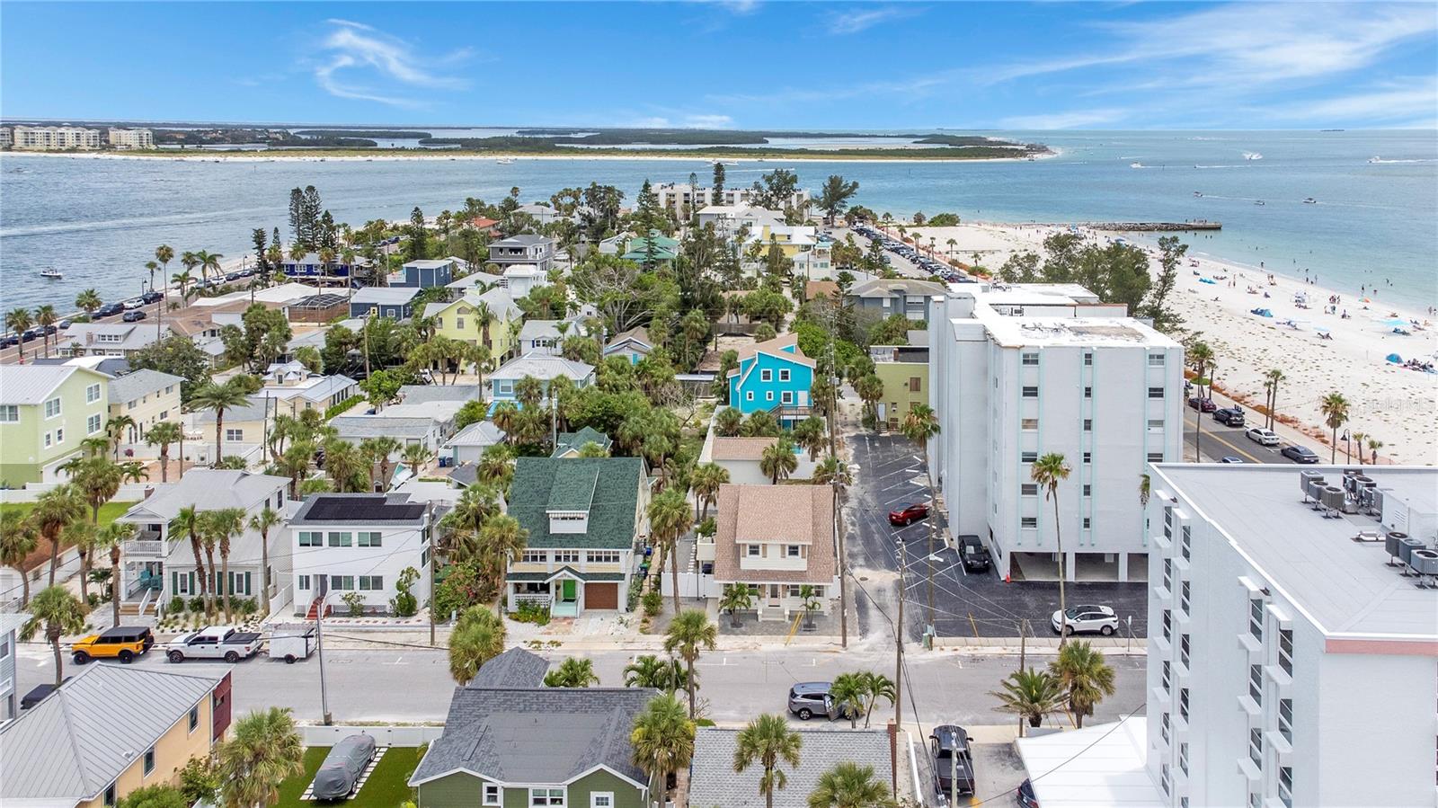 Discover a rare opportunity to own a piece of paradise in Pass-a-Grille Historic District, one of Florida's most coveted and historic beach communities. This meticulously updated 1910 FURNISHED bungalow, perched on a spacious corner lot, offers beautiful Gulf views and an unparalleled coastal lifestyle. Adding to its incredible value and versatility is a separate unfinished guest house over the garage, presenting a fantastic opportunity for an in-law suite, rental income, or additional flexible living space.
Step inside and be greeted by the warm elegance of 9-inch wide French Oak flooring that extends throughout the bright and airy interiors. The heart of this home is the custom gourmet kitchen, a true entertainer's delight. It features Shaker-style cabinetry with soft-close drawers, pristine quartz countertops, and top-of-the-line Cafe appliances. An oversized island, ideal for entertaining, anchors the kitchen, while the farmhouse sink is perfectly positioned to capture dazzling emerald water views, transforming every meal into a luxurious experience.
This charming residence boasts four generous bedrooms plus a versatile loft, and two full bathrooms. The upstairs sanctuary includes three bedrooms, a full bath, and a loft space crowned with a cathedral ceiling, offering a private retreat.
Significant enhancements elevate this property to new heights of luxury and convenience. A new roof installed in June 2025, newer water heater, vinyl fence, pavers, and more contributing to its exquisite curb appeal and low-maintenance charm.
Your Pass-a-Grille Lifestyle Awaits - Imagine waking up to the soothing sounds of the waves, with the beach less than 200 feet from your doorstep. Spend your days swimming, paddle-boarding, kayaking, or fishing in the warm Gulf waters. Enjoy leisurely walks along the shore, or simply relax in your beach chair, soaking in breathtaking sunsets.
The vibrant Pass-a-Grille lifestyle extends beyond your doorstep. Stroll to Historic 8th Avenue for an array of unique shops, acclaimed dining establishments, and lively community events. Bike to the serene Lazarillo Park or visit the iconic Don CeSar Hotel, a local landmark. For a change of pace, a short drive connects you to Downtown St. Pete's bustling cultural scene, offering five-star dining, world-class museums, and exciting entertainment options.
Don't miss the rare opportunity to own a truly extraordinary piece of Pass-a-Grille's heritage. This unique beach home, brimming with authentic Florida character and perfectly situated in the historic district, invites you to embrace life as it was always meant to be lived. Schedule your private showing today!