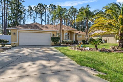 Photo of 33 Red Clover Lane, Palm Coast, FL 32164 (MLS # FC315745)
