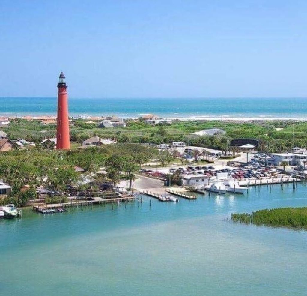 Photo of 2100 N Peninsula Avenue #102, New Smyrna Beach, FL 32169 (MLS # NS1085827)