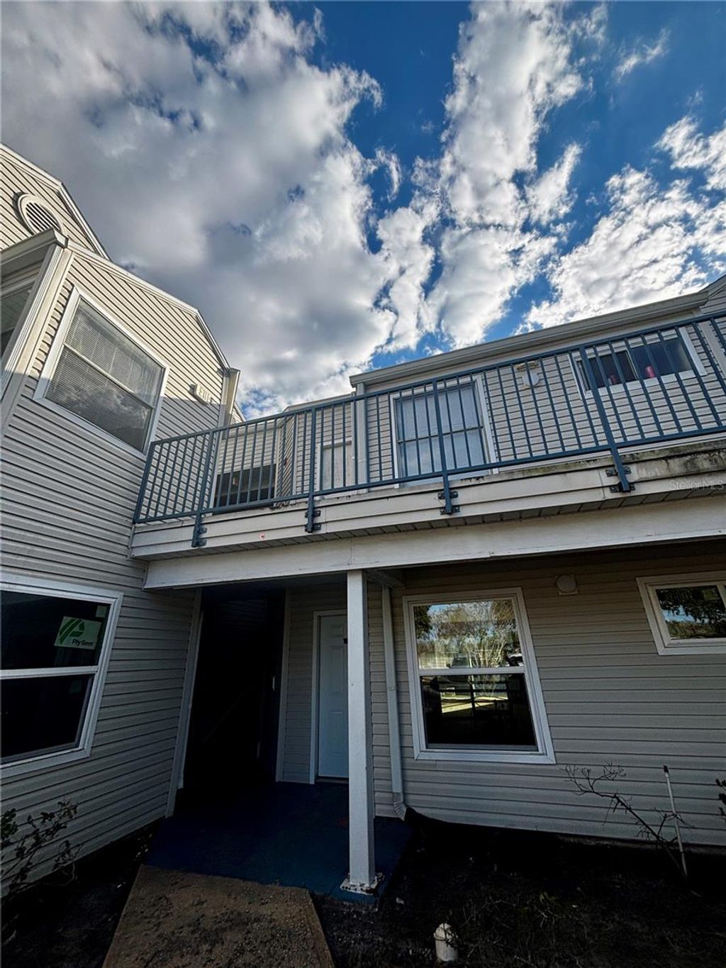 Photo of 2504 Woodgate Boulevard #202, Orlando, FL 32822 (MLS # O6371611)