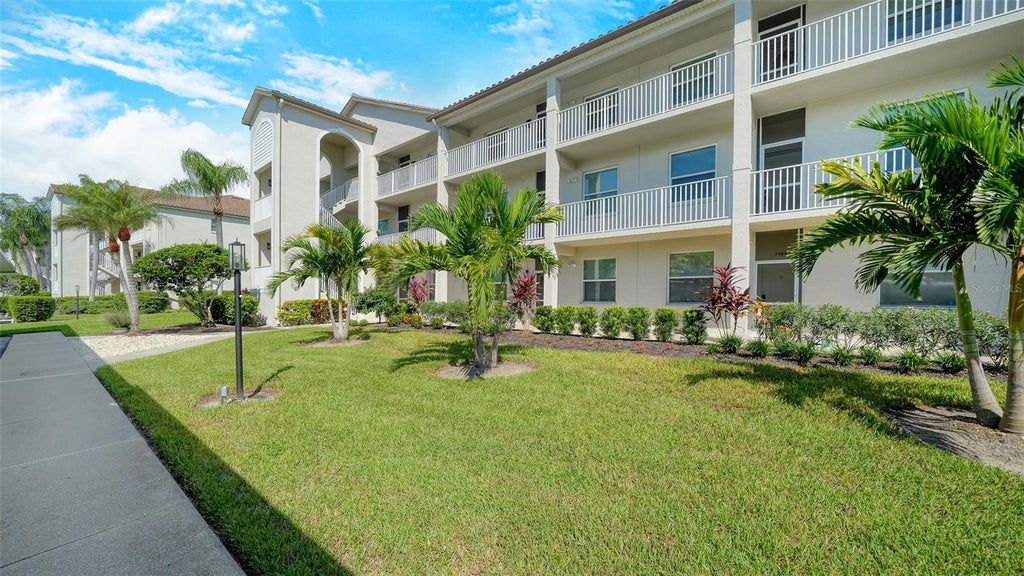 Photo of 8755 Olde Hickory Avenue #7102, Sarasota, FL 34238 (MLS # A4710226)