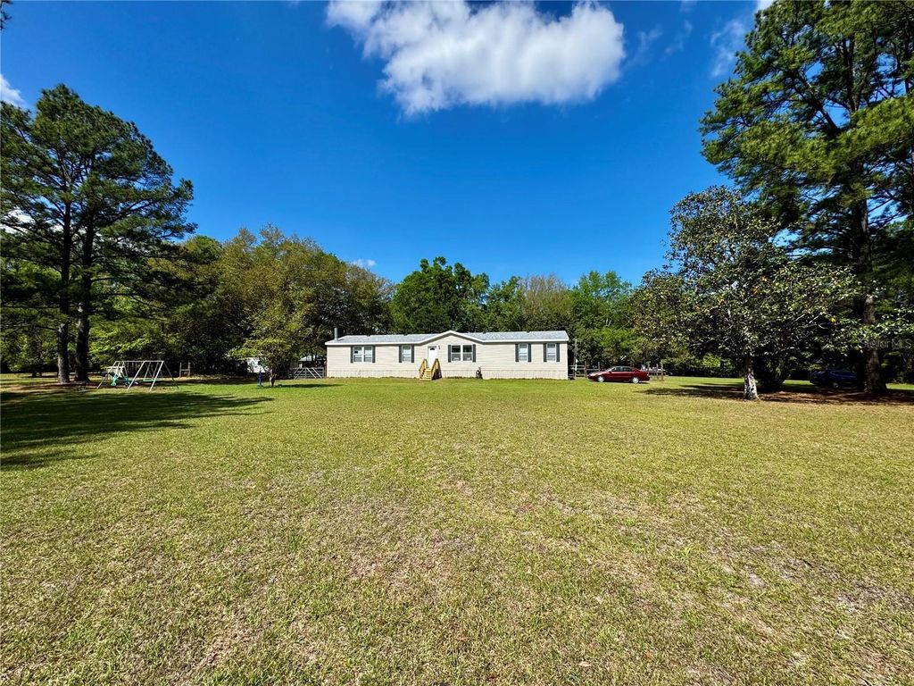 Photo of 7222 NW 205th Terrace, Alachua, FL 32615 (MLS # GC539203)